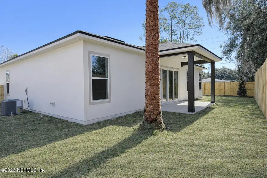 Exterior details and patio area of a home in , Orange Park (Image 4).