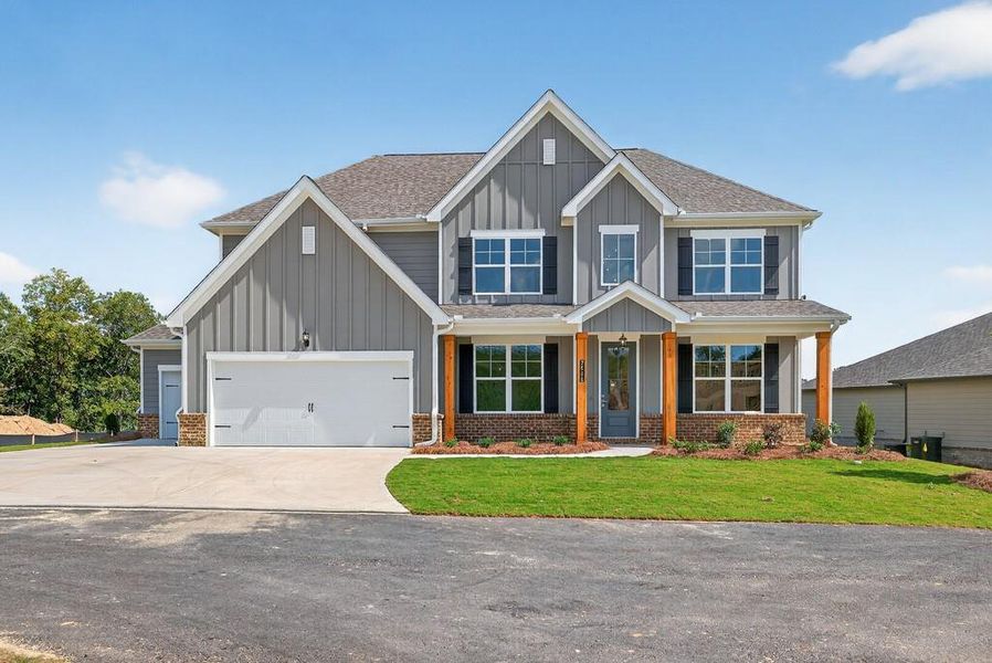 Front exterior of a new home in The Manor at Gainesville Township, Gainesville, GA, highlighting curb appeal (Image 26). Front exterior of a new home in The Manor at Gainesville Township, Gainesville, GA, highlighting curb appeal (Image 26).