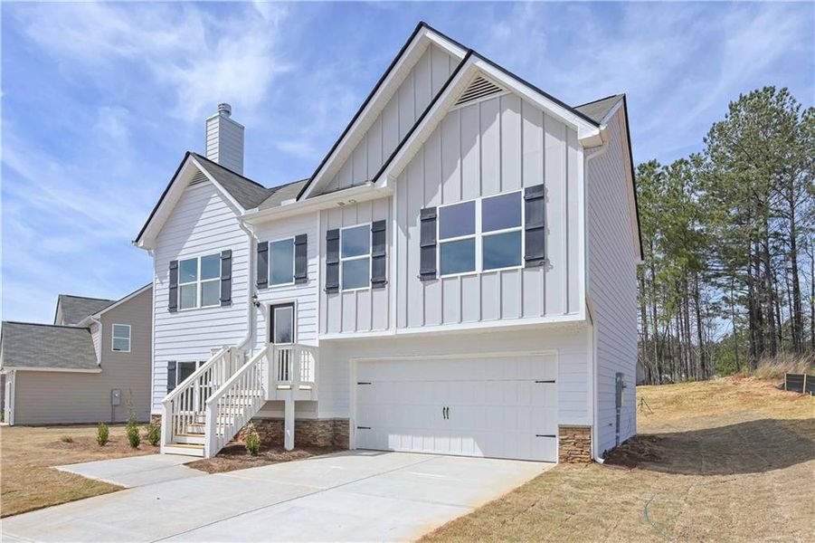 Front exterior of a new home in , Villa Rica, GA, highlighting curb appeal (Image 1). Front exterior of a new home in , Villa Rica, GA, highlighting curb appeal (Image 1).