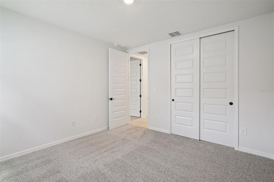 Spacious, unfurnished interior of a new home in Two Rivers - Signature Series, Zephyrhills (Image 16).