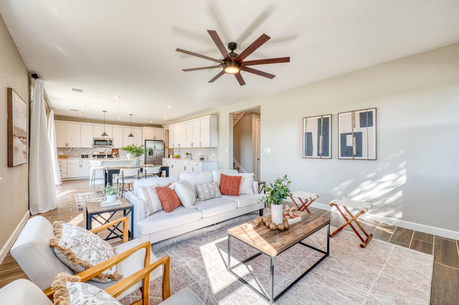An open floorplan seamlessly connects the central living area with the kitchen. An open floorplan seamlessly connects the central living area with the kitchen.