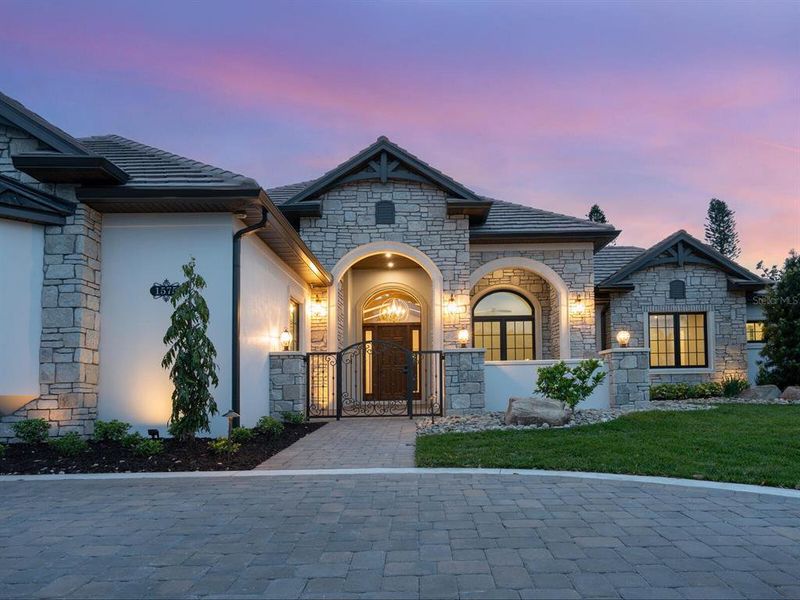 Front exterior of a new home in , Sarasota, FL, highlighting curb appeal (Image 25).
