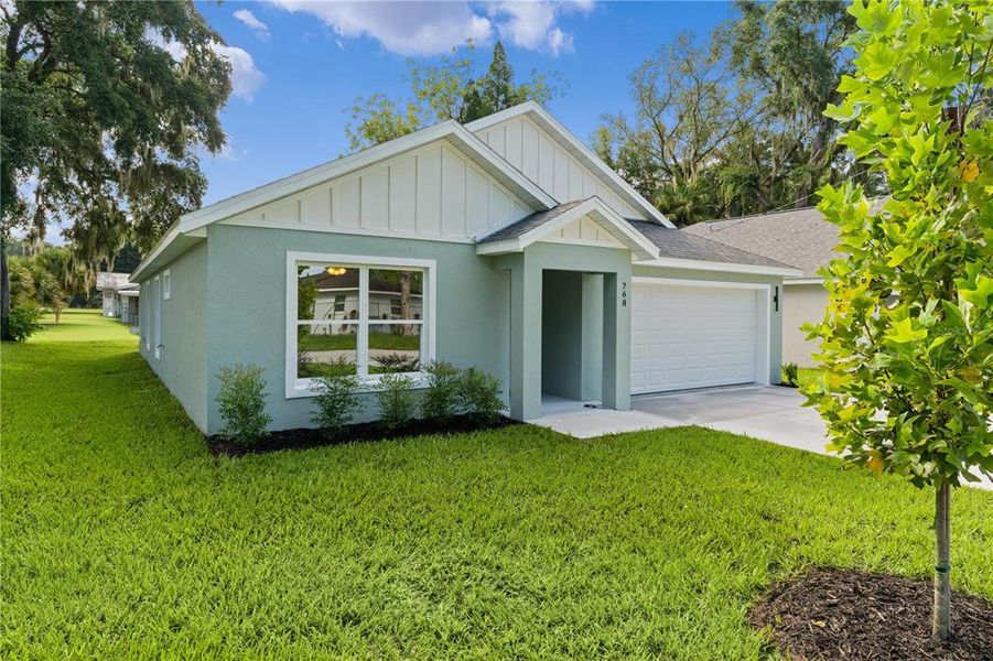 Front exterior of a new home in , Wildwood, FL, highlighting curb appeal (Image 23). Front exterior of a new home in , Wildwood, FL, highlighting curb appeal (Image 23).