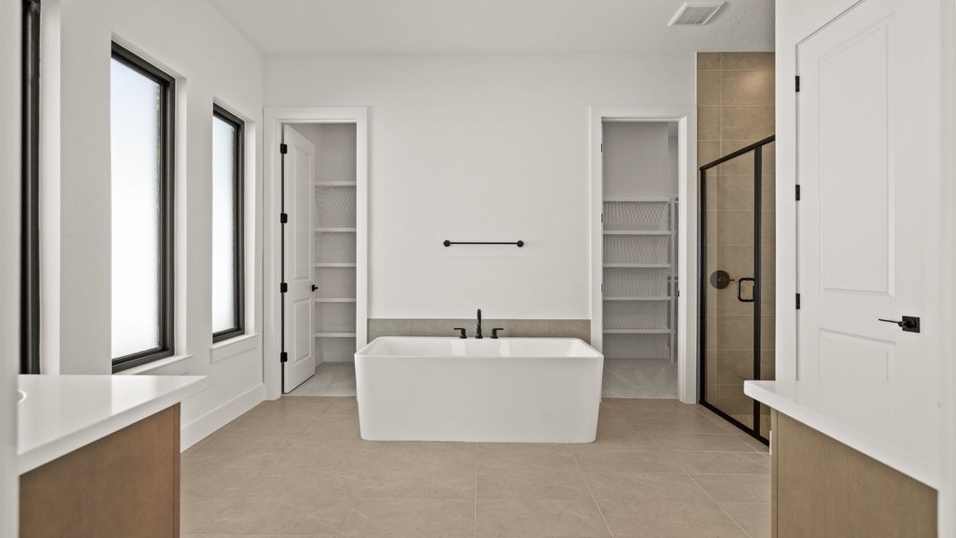 Furnished interior view inside a new home in Glynlea Country Club, Port St. Lucie (Image 7).