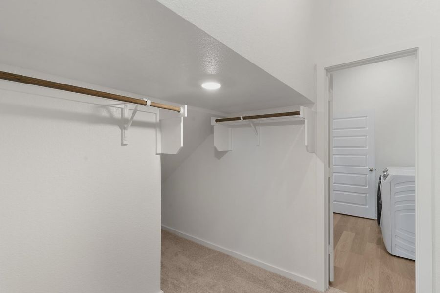 Representative unfurnished interior of a home built from the Wilshire by Chesmar Homes in Stream Waters, Buda (Image 17).