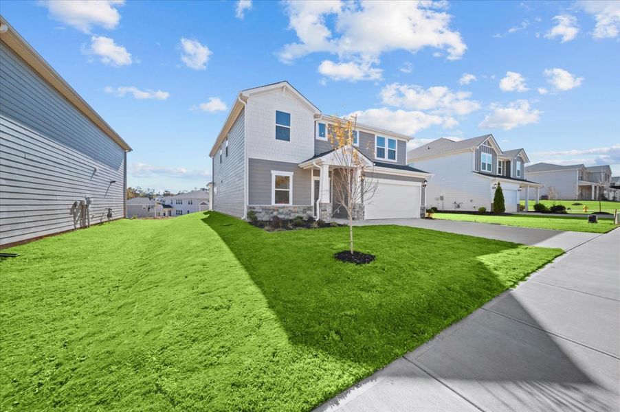 Front exterior of a new home in Reserve at Arden Woods, Greenville, SC, highlighting curb appeal (Image 2).