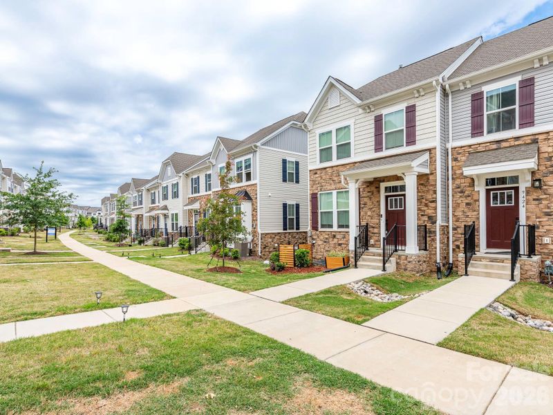 Front exterior of a new home in , Charlotte, NC, highlighting curb appeal (Image 22).