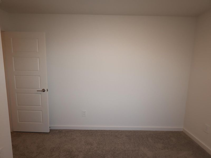 Spacious, unfurnished interior of a new home in Pinewood at Grand Texas, New Caney (Image 21).