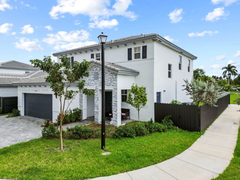 Front exterior of a new home in , Miami, FL, highlighting curb appeal (Image 20). Front exterior of a new home in , Miami, FL, highlighting curb appeal (Image 20).
