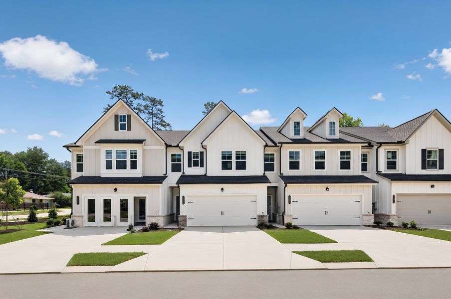 Front exterior of a new home in Pinewood Townhomes, Chattanooga, TN, highlighting curb appeal (Image 1). Front exterior of a new home in Pinewood Townhomes, Chattanooga, TN, highlighting curb appeal (Image 1).