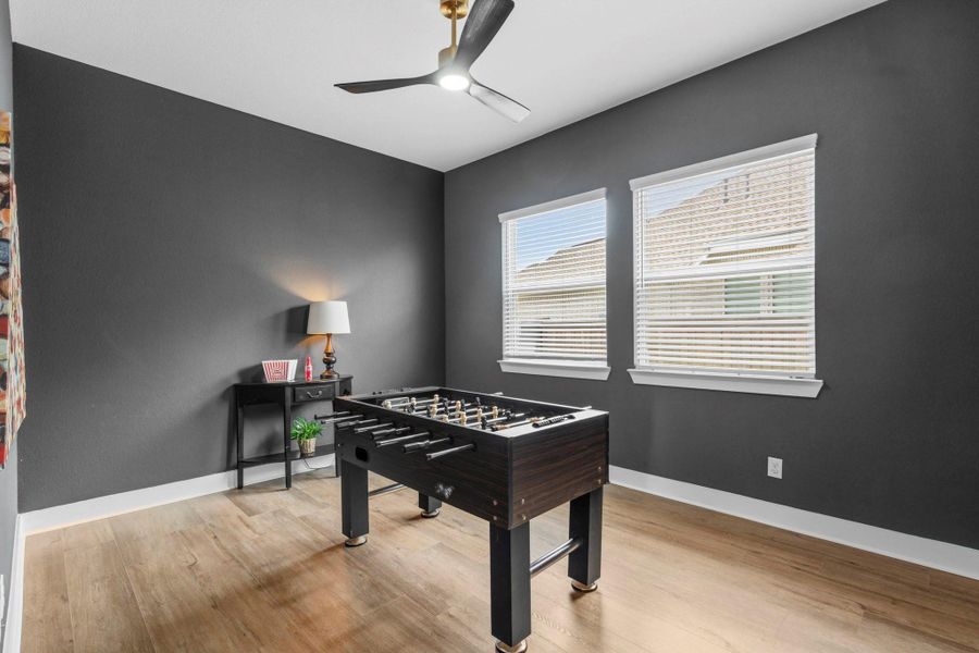 Located just off the Mud Room, this stylish and versatile Flex Space offers endless possibilities to suit your lifestyle. Whether envisioned as a Game Room, Media Room, Fitness Studio, or Second Office, the room provides the flexibility to adapt to your evolving needs.