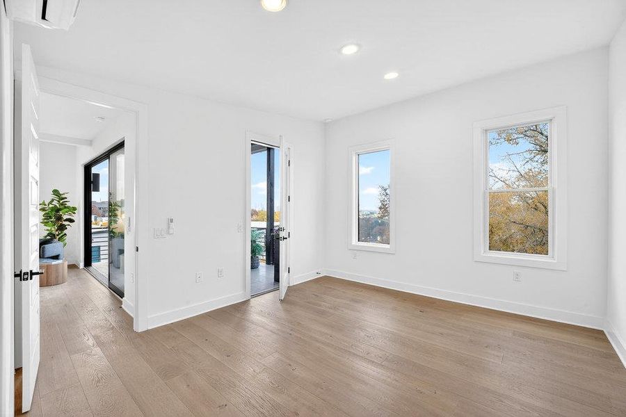 Unfurnished room with recessed lighting and light wood-style flooring