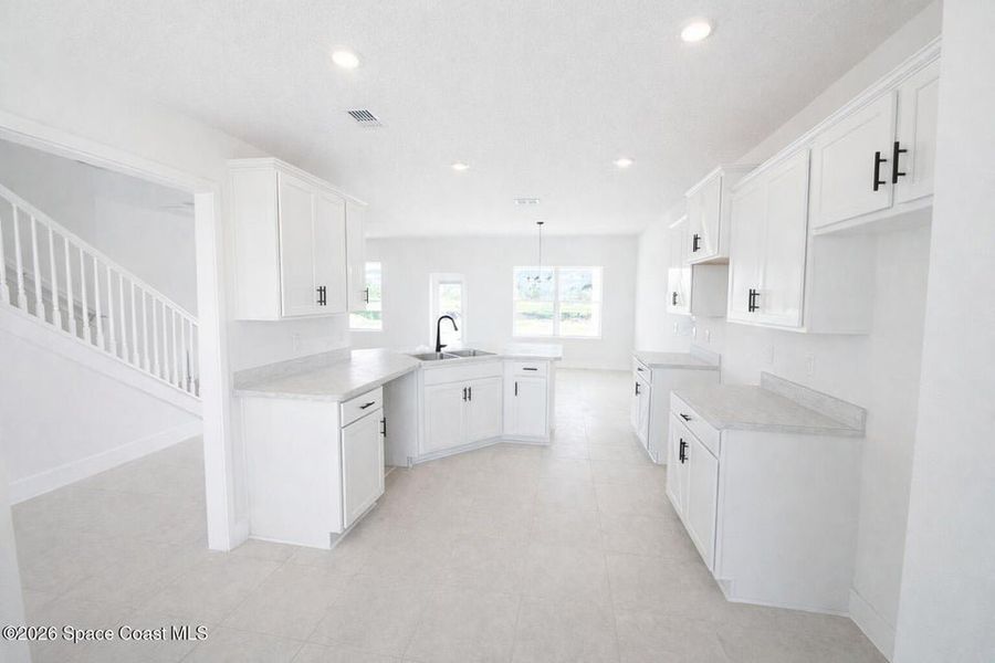 Furnished interior view inside a new home in St. John's Preserve, Palm Bay (Image 9).