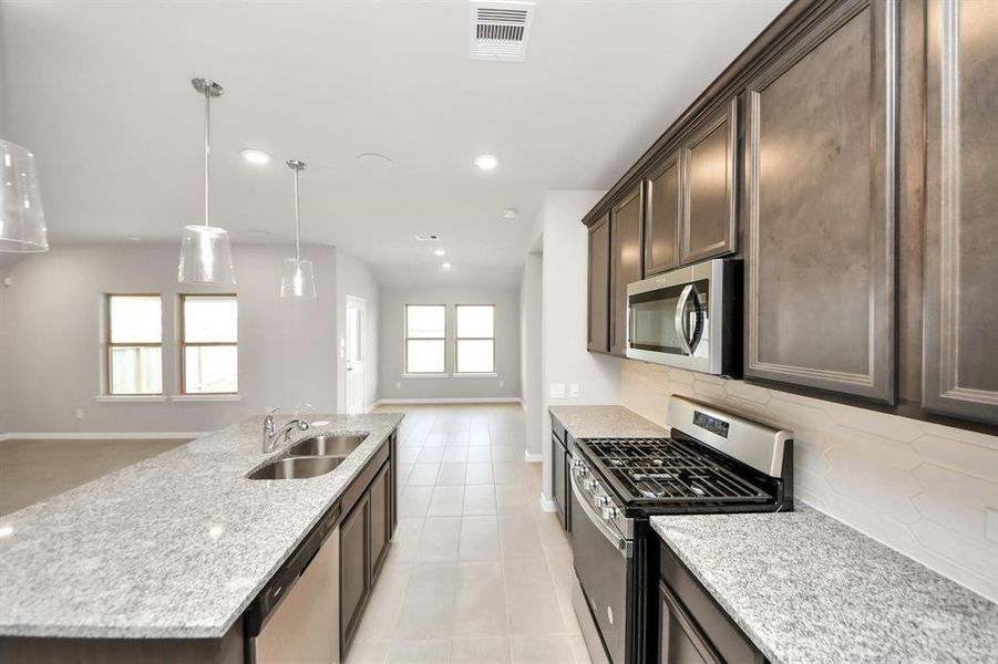 Furnished interior view inside a new home in Sweetgrass Village, Crosby (Image 18).