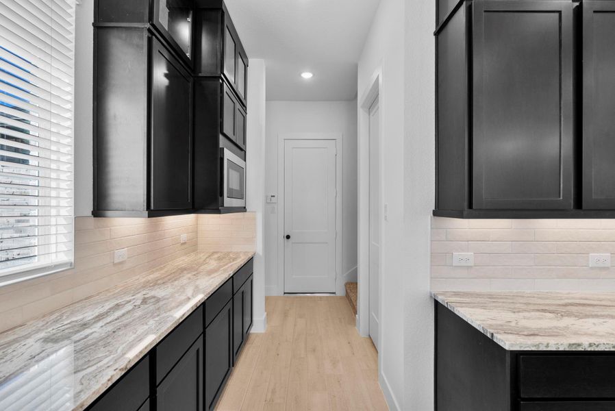 Furnished interior view inside a new home in Blue Heron, Mont Belvieu (Image 10).