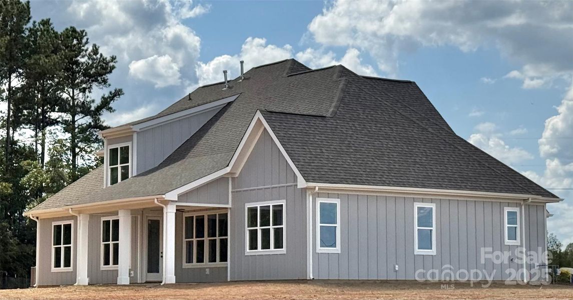 Front exterior of a new home in , Waxhaw, NC, highlighting curb appeal (Image 22).