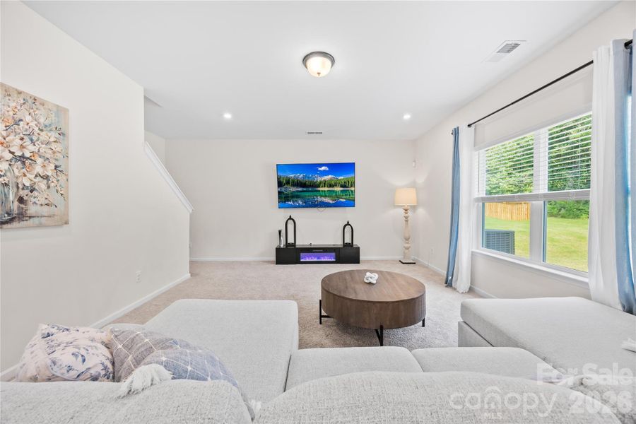Furnished interior view inside a new home in Orchard Creek, Charlotte (Image 12).