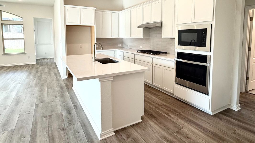 Furnished interior view inside a new home in Carillon, Manor (Image 7).