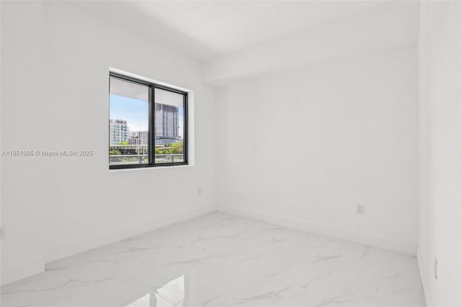 Spacious, unfurnished interior of a new home in Aria Reserve, Miami (Image 19).