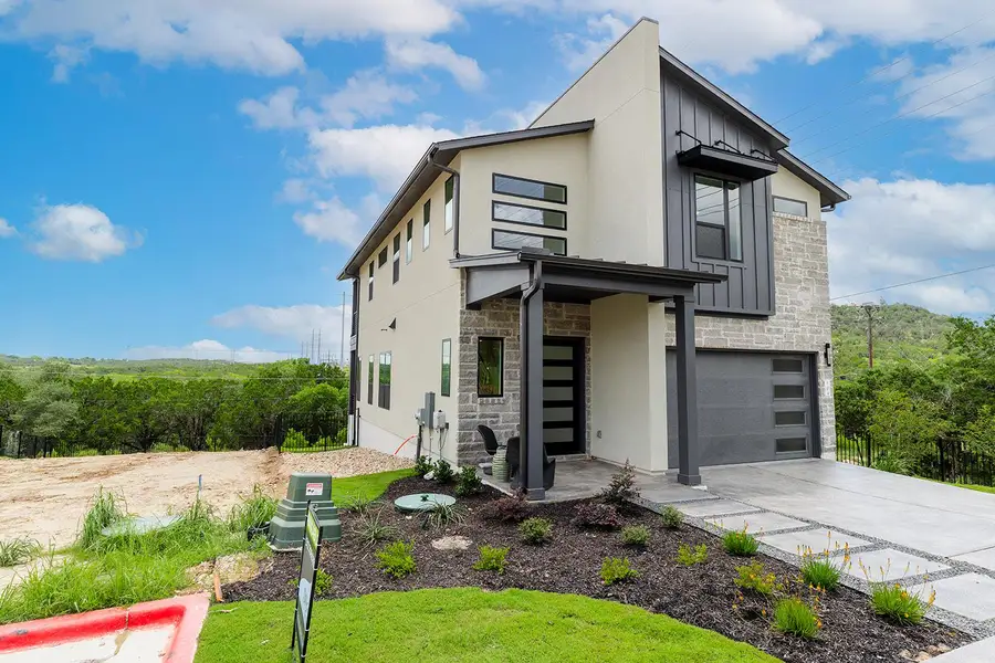 Corner lot backing to green space with hill country views