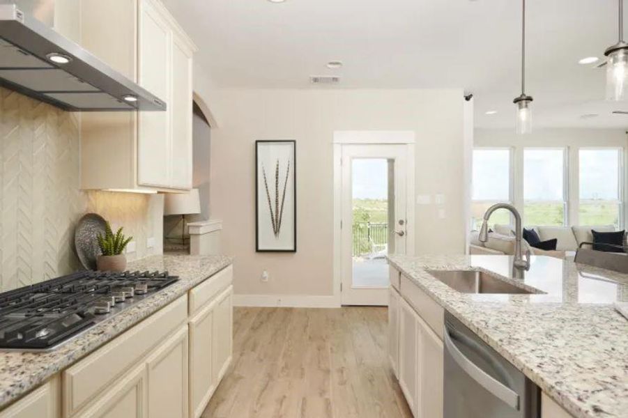 Photo of Pulte model home with same floor plan, not of actual home listed.