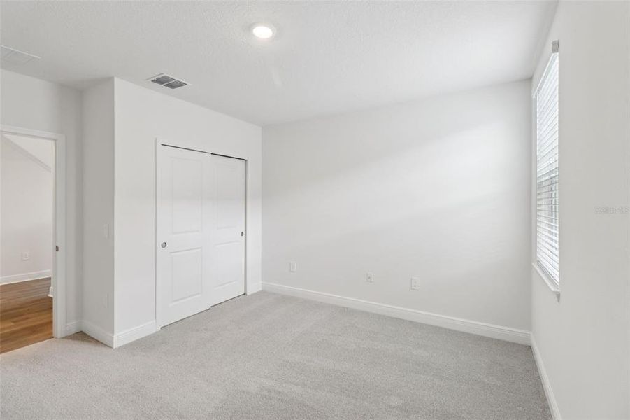 Spacious, unfurnished interior of a new home in The Reserve at Hammock Oaks - Classic Series, Lady Lake (Image 26). Spacious, unfurnished interior of a new home in The Reserve at Hammock Oaks - Classic Series, Lady Lake (Image 26).