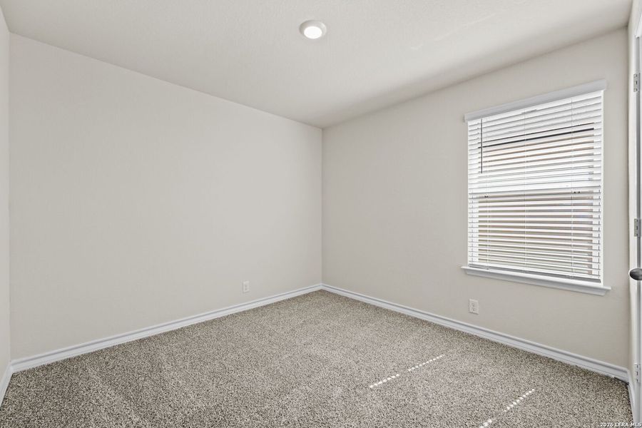 Spacious, unfurnished interior of a new home in Brookstone Creek, San Antonio (Image 11).
