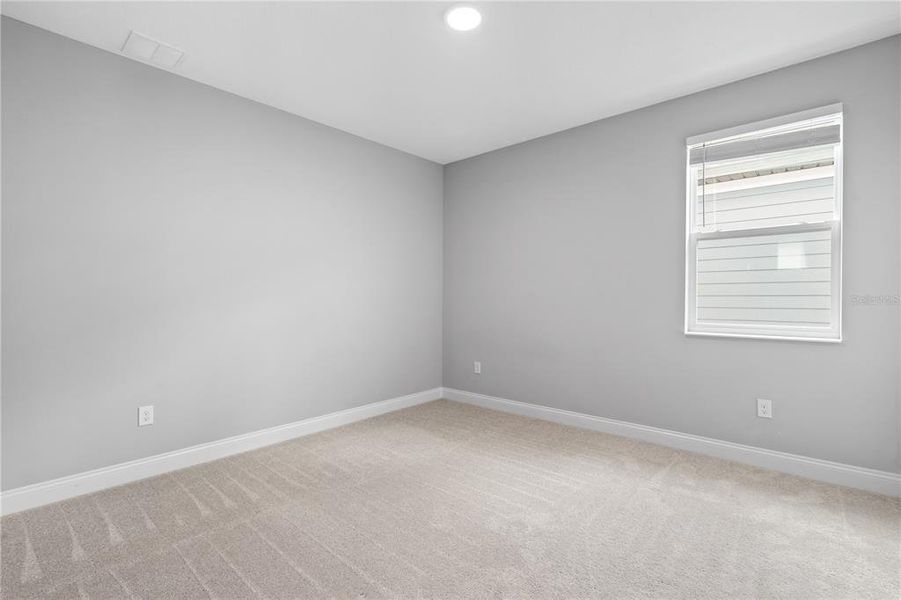 Spacious, unfurnished interior of a new home in Encore at Ovation, Winter Garden (Image 33).