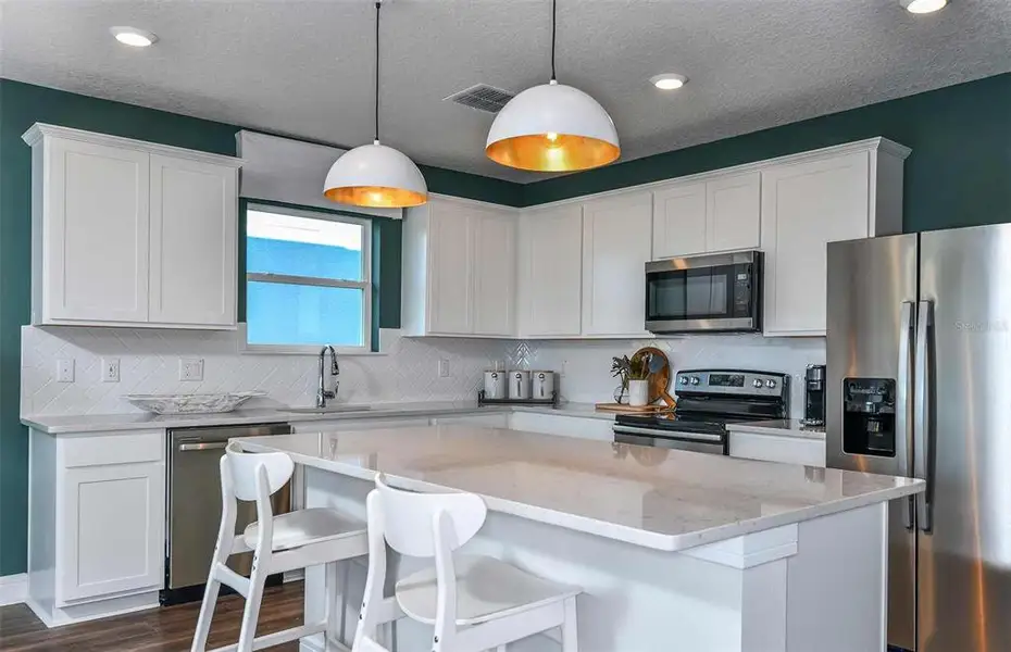Furnished interior view inside a new home in Oakfield Lakes, Parrish (Image 3).