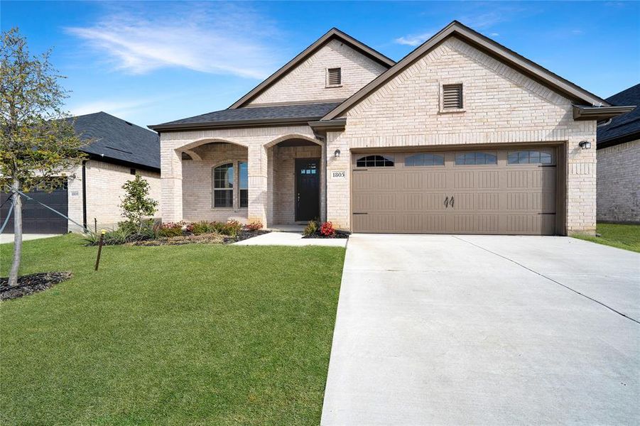 Front exterior of a new home in La Terra, Celina, TX, highlighting curb appeal (Image 2).