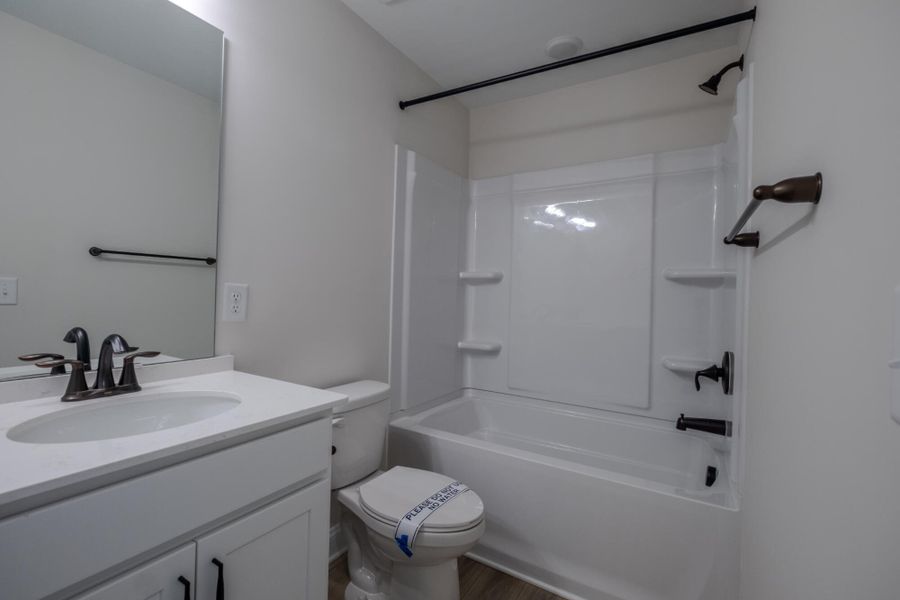 Furnished interior view inside a new home in Cottages at Piper Village, Trinity (Image 14). Furnished interior view inside a new home in Cottages at Piper Village, Trinity (Image 14).