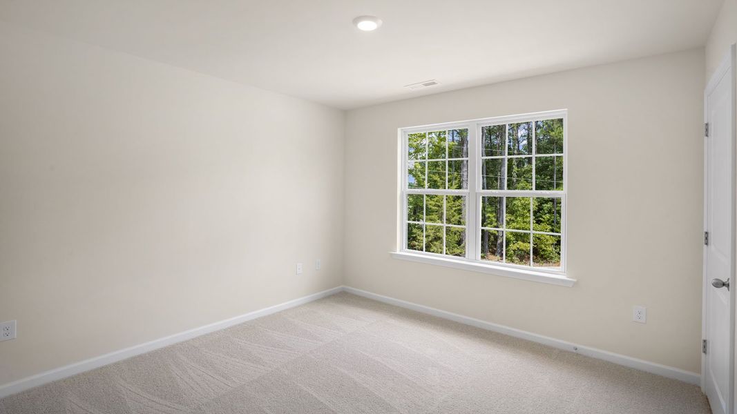 Spacious, unfurnished interior of a new home in Thornton Townes, Raleigh (Image 19).