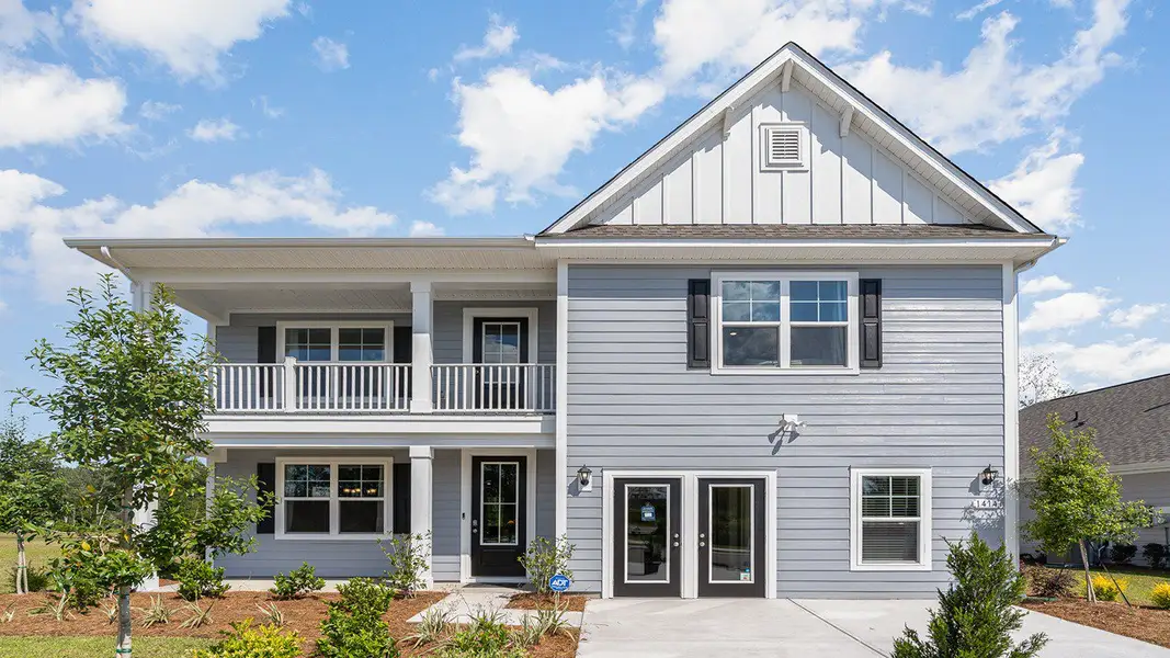 Representative exterior photo of a completed home built from the TILLMAN by D.R. Horton in Haven View, Murrells Inlet, SC (Image 1).
