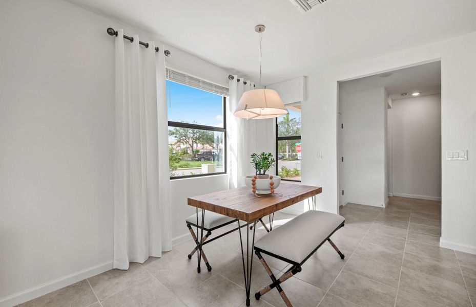 Café located off the kitchen and gathering room