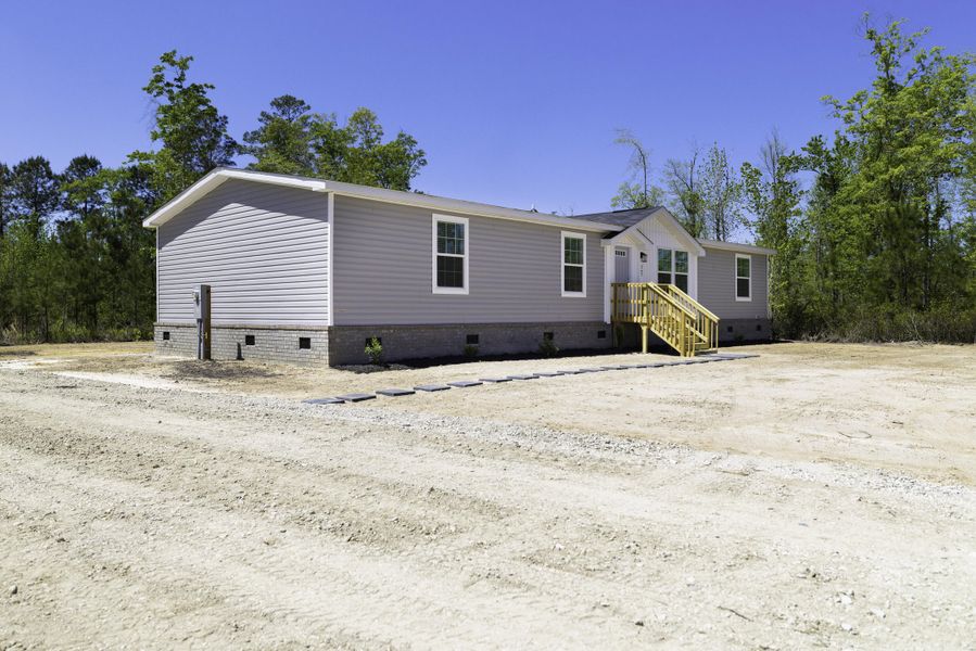 Exterior details and patio area of a home in , Cross (Image 25). Exterior details and patio area of a home in , Cross (Image 25).