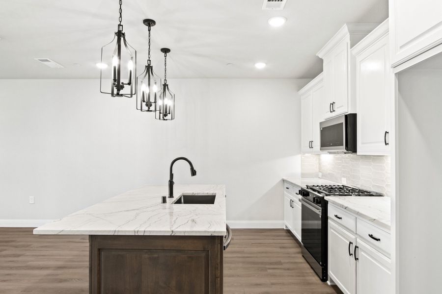 Furnished interior view inside a new home in The Tribute, The Colony (Image 11).
