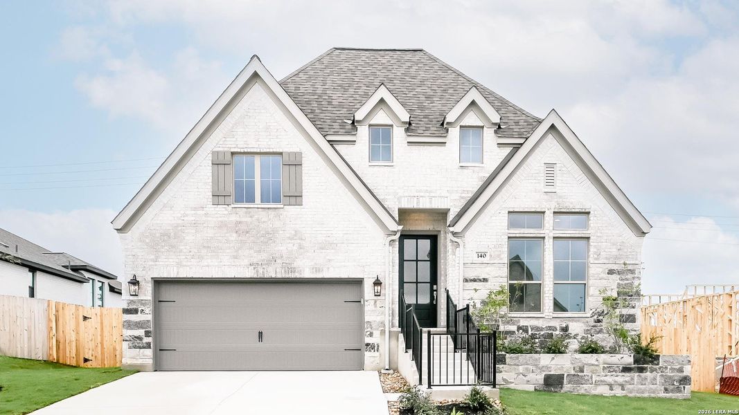 Front exterior of a new home in Cibolo Valley Heights, Cibolo, TX, highlighting curb appeal (Image 23). Front exterior of a new home in Cibolo Valley Heights, Cibolo, TX, highlighting curb appeal (Image 23).