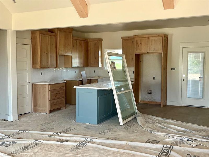 Kitchen featuring backsplash