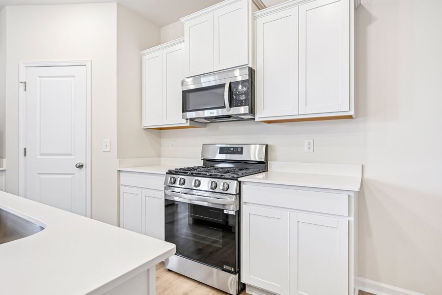 Furnished interior view inside a new home in Trenton Place, Roebuck (Image 11).