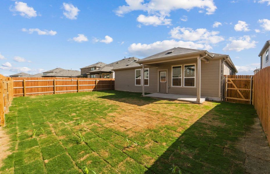 Exterior details and patio area of a home in Lagos, Manor (Image 15).