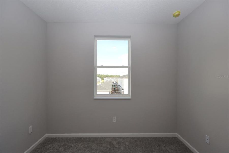 Spacious, unfurnished interior of a new home in Tribute at Ovation, Winter Garden (Image 33). Spacious, unfurnished interior of a new home in Tribute at Ovation, Winter Garden (Image 33).