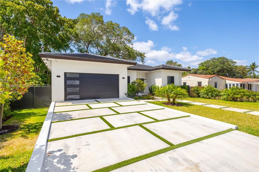 Front exterior of a new home in , Biscayne Park, FL, highlighting curb appeal (Image 28).