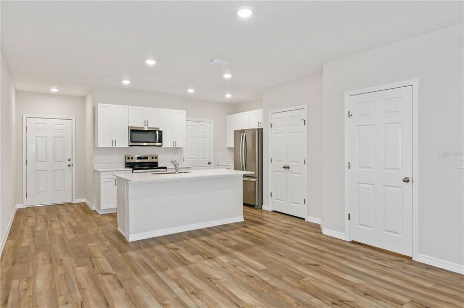 Furnished interior view inside a new home in Grove at Crosswind, Haines City (Image 5).