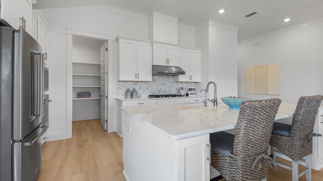 Representative furnished interior of a home built from the Jubilee by D.R. Horton in Breakfast Point East Phase II, Panama City Beach (Image 13).