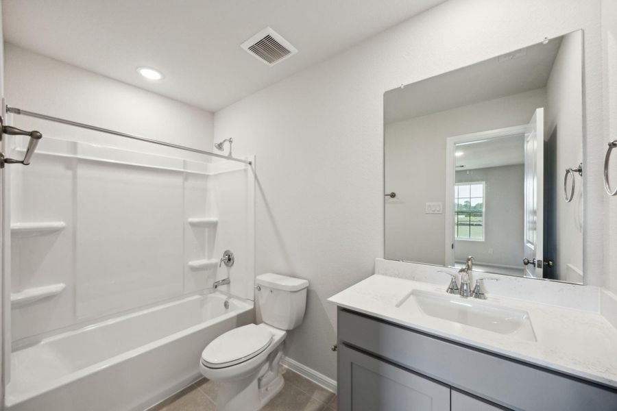 Furnished interior view inside a new home in Saint Tropez, Huffman (Image 9).