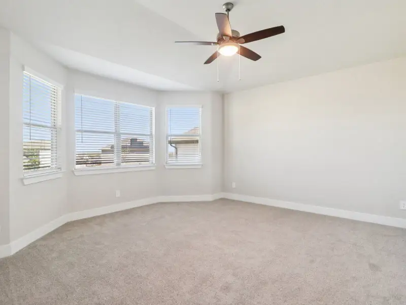 Spacious, unfurnished interior of a new home in Legendary Trails - Premier Series, Cibolo (Image 19).