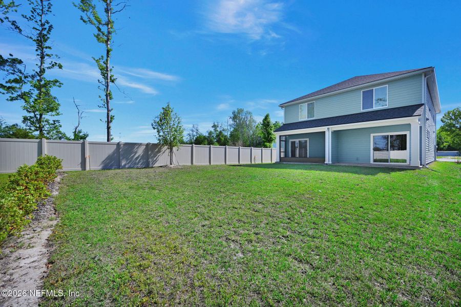 Exterior details and patio area of a home in Baxley Villas, Middleburg (Image 19).