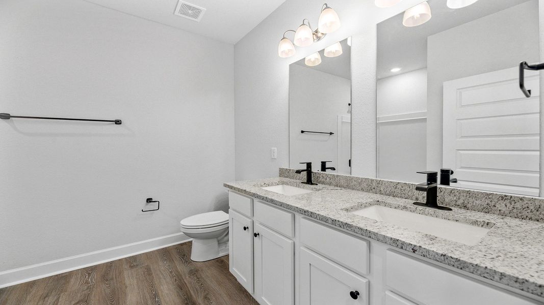 Representative furnished interior of a home built from the The Jasmine by D.R. Horton in Meadows at Rehwinkel, Crawfordville (Image 6).
