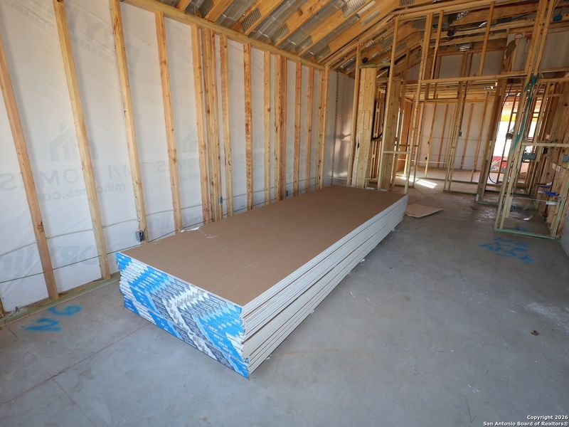 In-progress construction of a new home in Chaparral Ranch, Floresville, TX (Image 33).