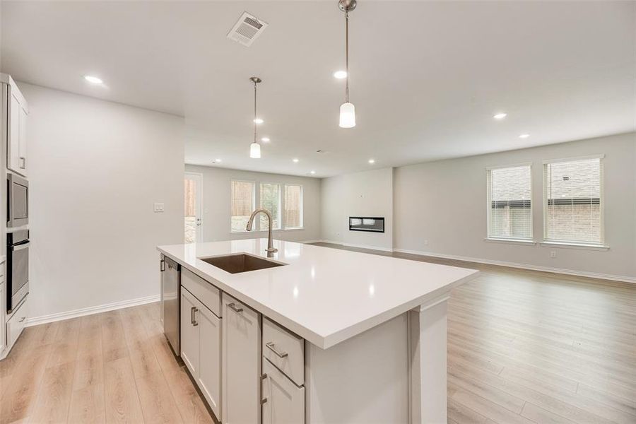 Furnished interior view inside a new home in Villages of Hurricane Creek, Anna (Image 3).